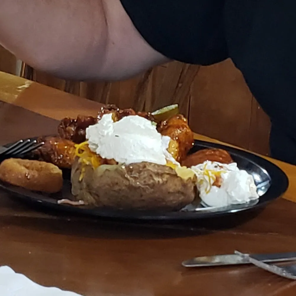 Pulled Pork Sandwich and Baked Potato